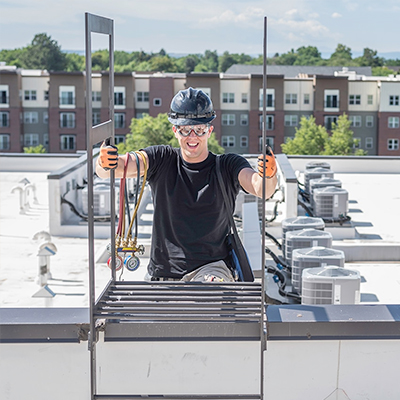 An image of an HVAC Contractor at work